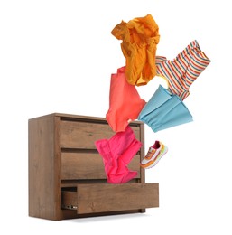 Image of Clothes flying out of dresser on white background