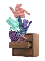 Image of Clothes flying out of dresser on white background