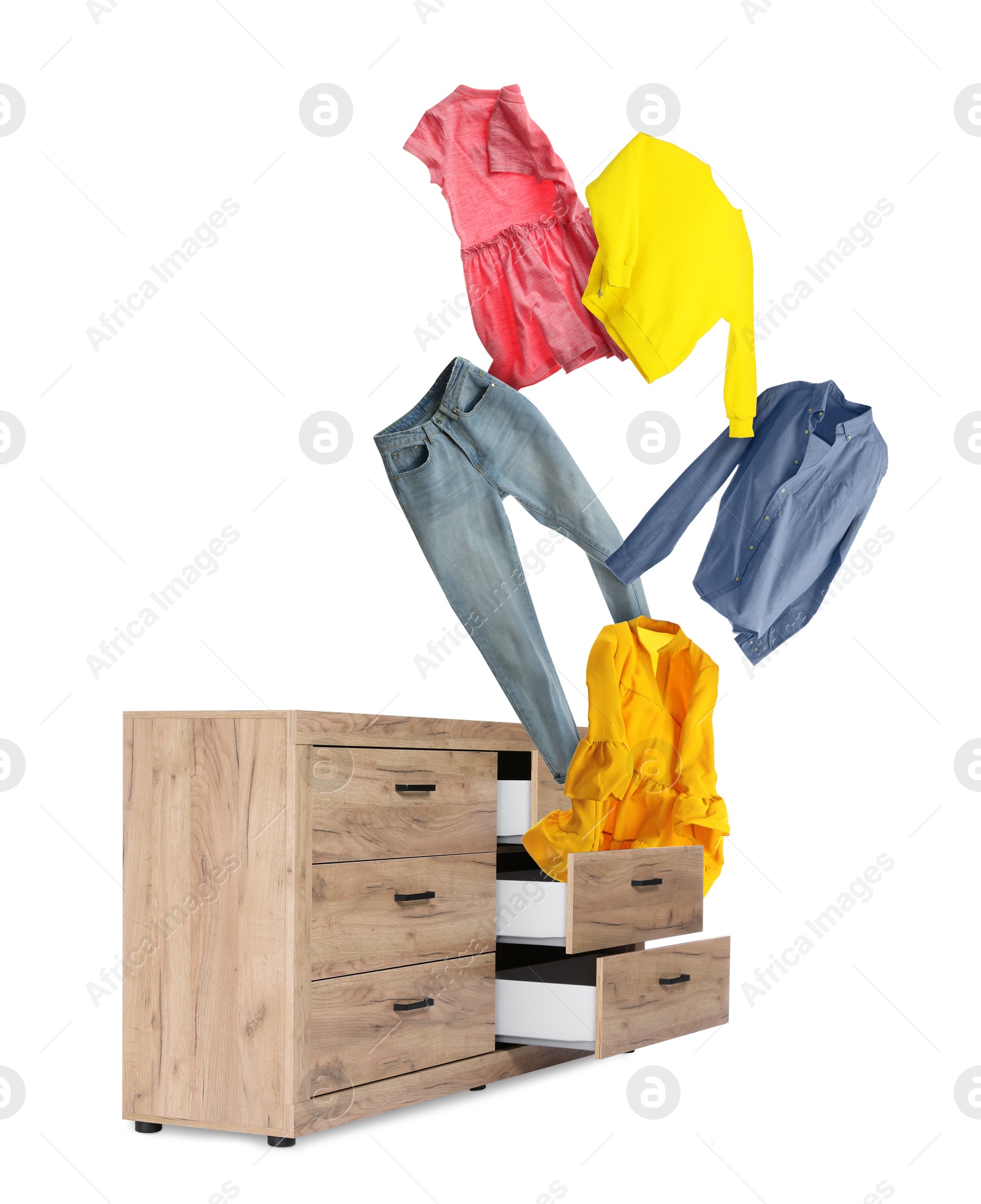 Clothes flying out of dresser on white background Image of Clothes flying out of dresser on white background