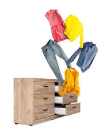 Image of Clothes flying out of dresser on white background