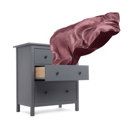 Image of Fabric flying out of dresser on white background