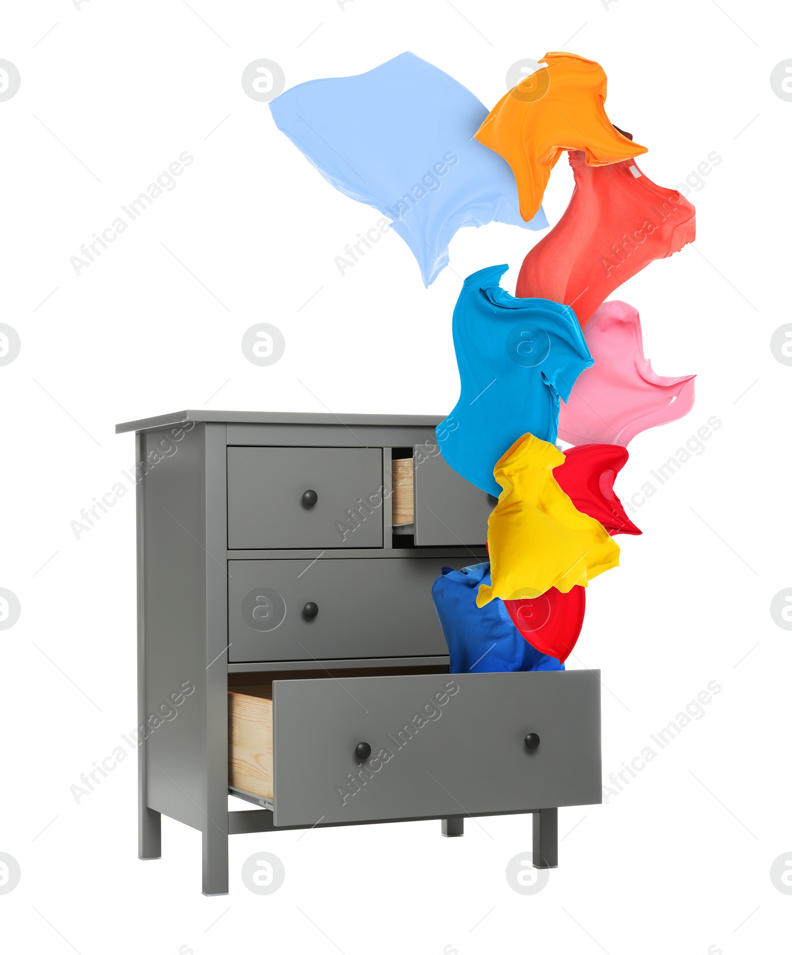 Clothes flying out of dresser on white background Image of Clothes flying out of dresser on white background
