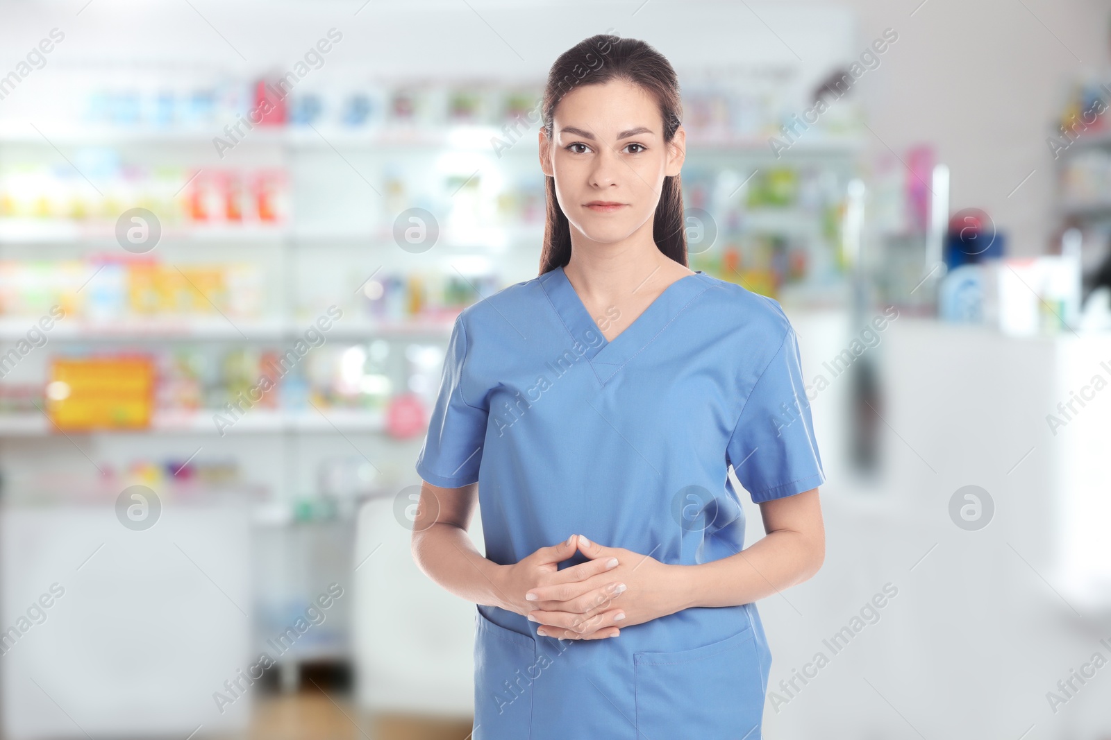 Portrait of pharmacist in uniform at drugstore Image of Portrait of pharmacist in uniform at drugstore