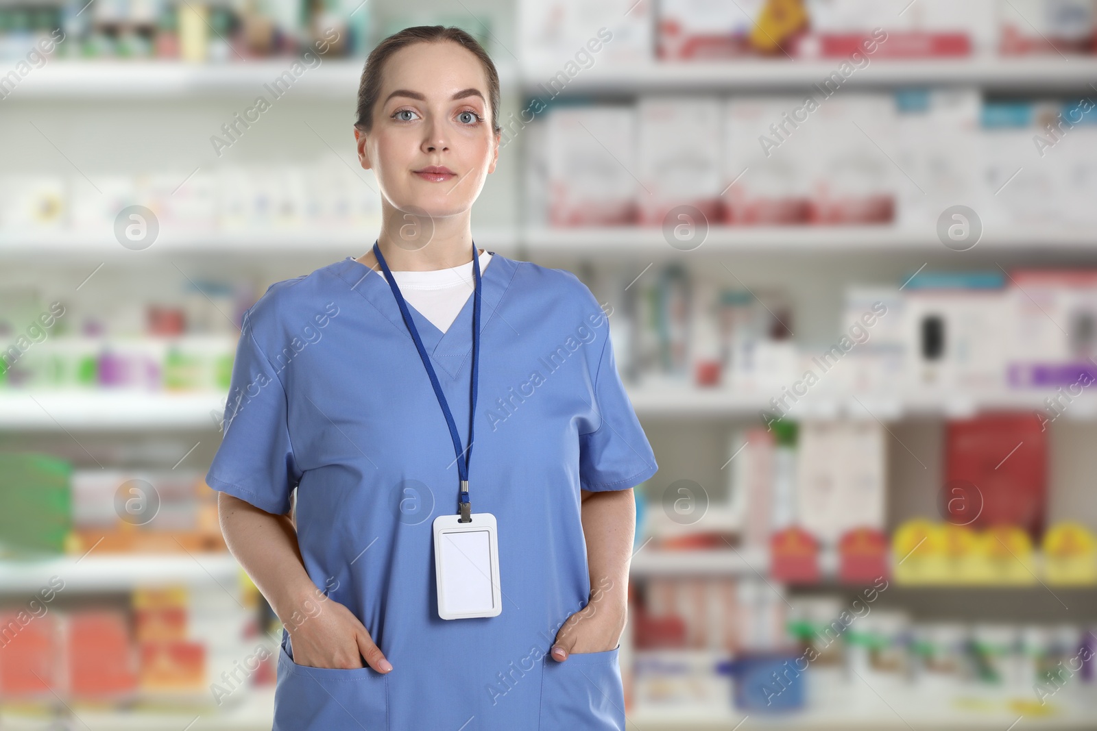 Portrait of pharmacist in uniform at drugstore Image of Portrait of pharmacist in uniform at drugstore