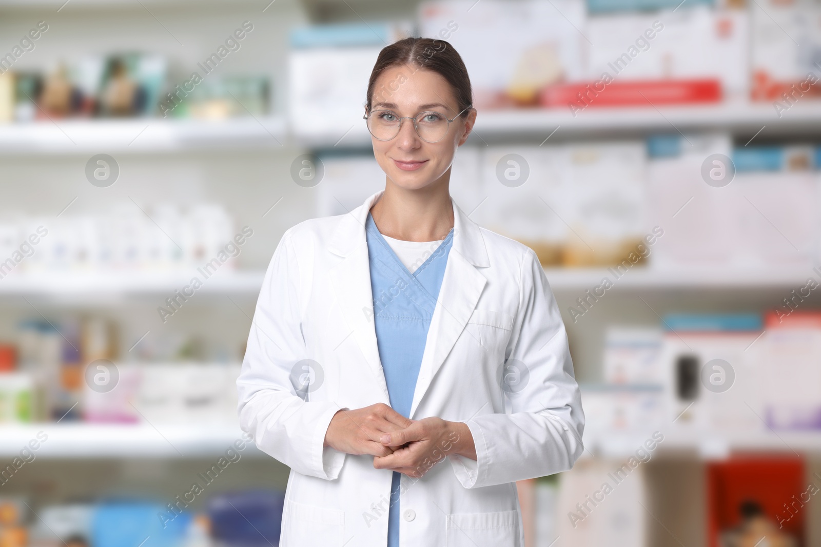 Portrait of pharmacist in uniform at drugstore Image of Portrait of pharmacist in uniform at drugstore