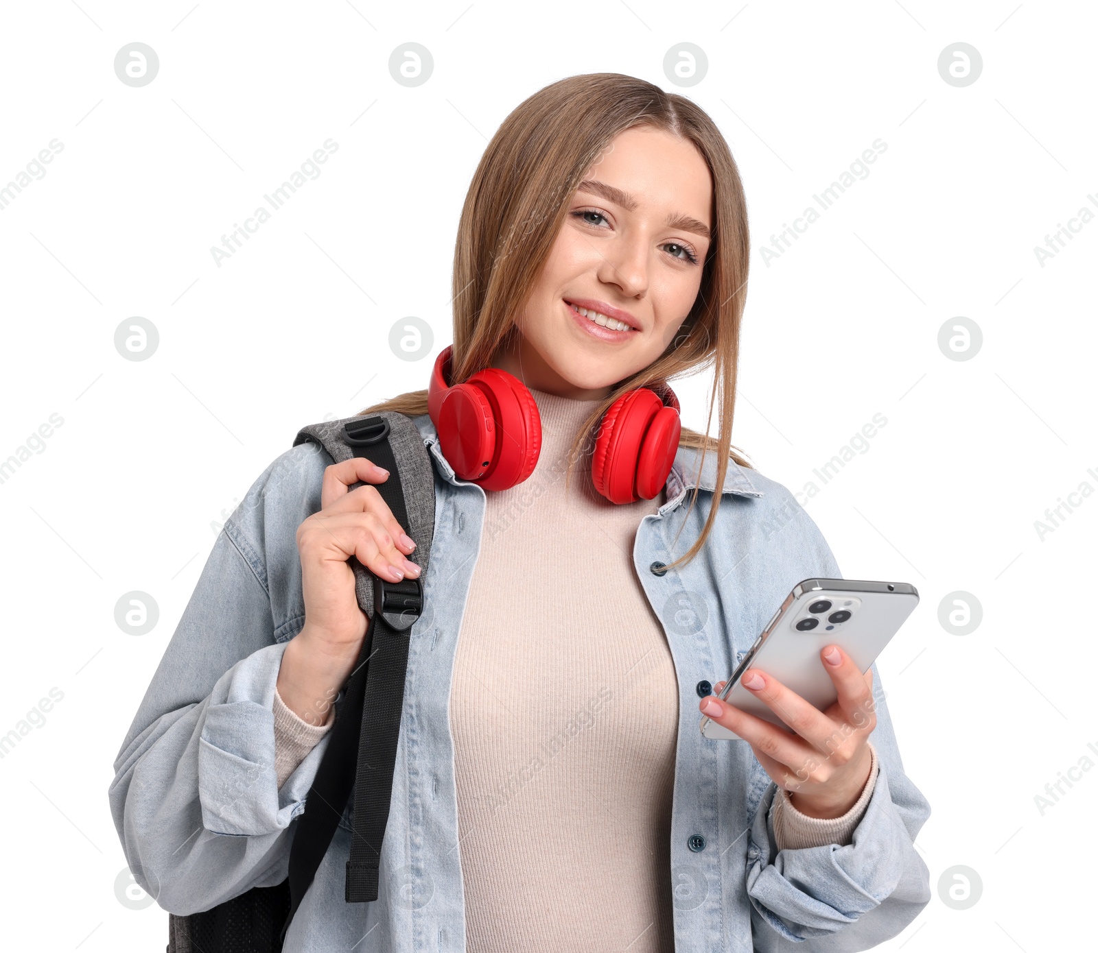 Smiling teenage girl with smartphone on white background Photo of Smiling teenage girl with smartphone on white background