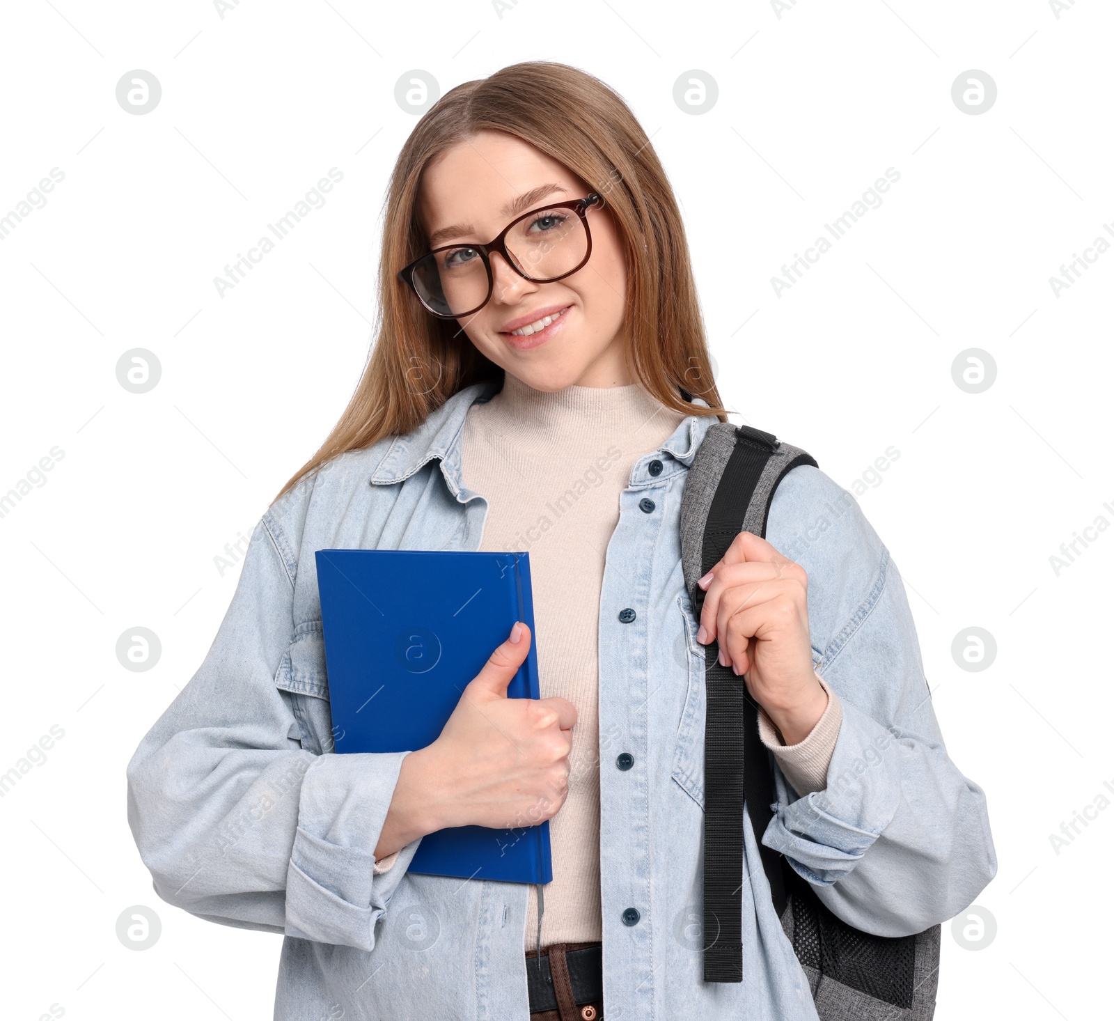 Smiling teenage girl with backpack and book on white background Photo of Smiling teenage girl with backpack and book on white background