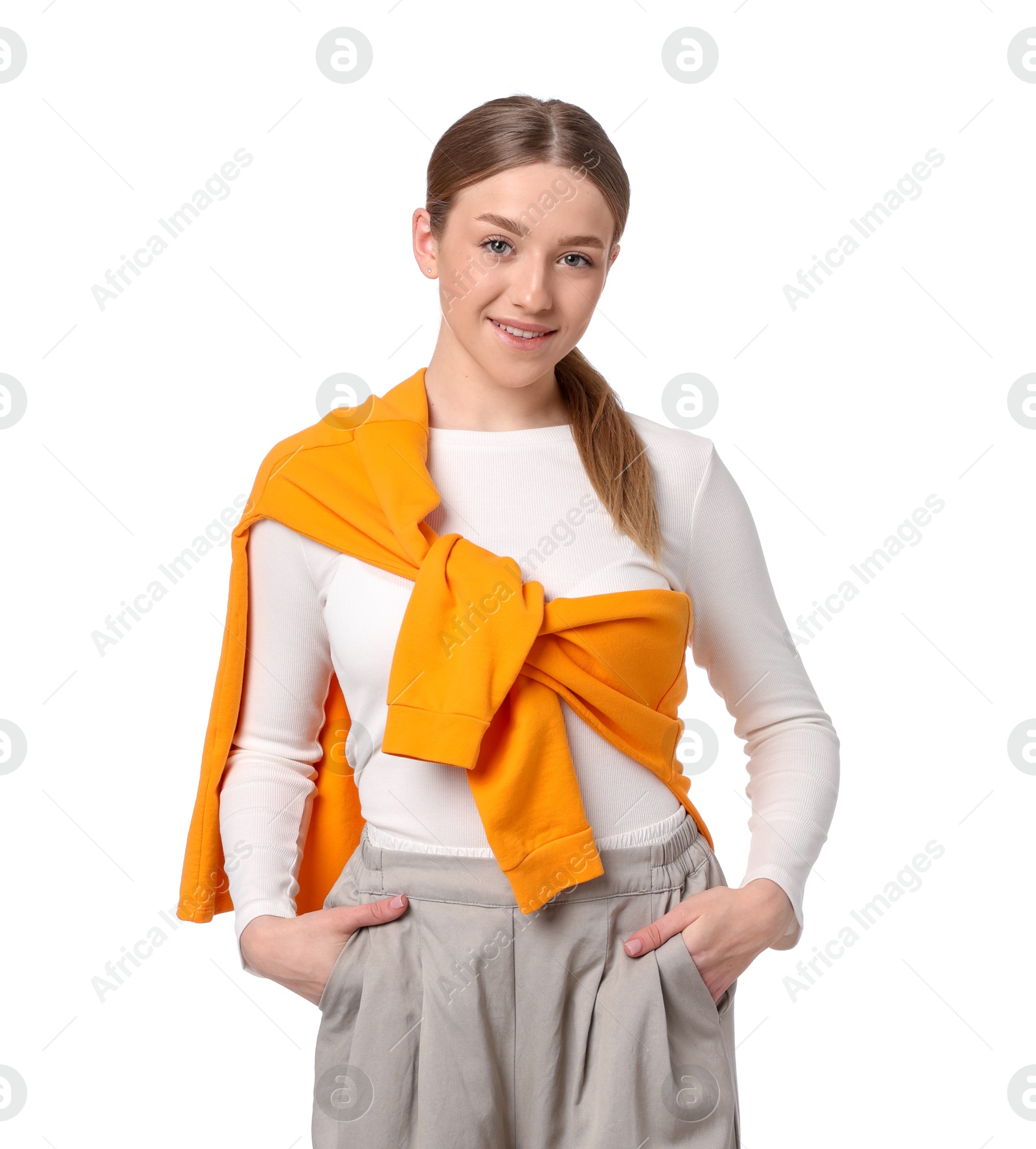 Portrait of smiling teenage girl on white background Photo of Portrait of smiling teenage girl on white background