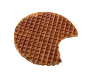 Photo of Bitten round Dutch waffle isolated on white