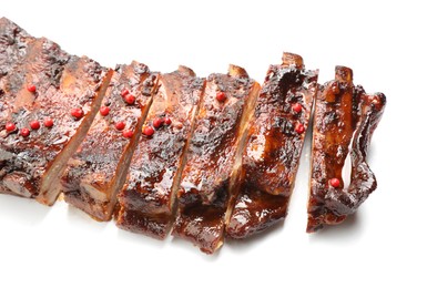 Photo of Delicious roasted pork ribs isolated on white