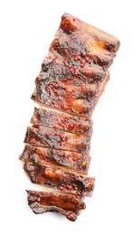 Photo of Delicious roasted pork ribs isolated on white, top view