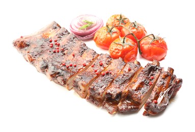 Photo of Delicious roasted pork ribs with tomatoes and onion isolated on white