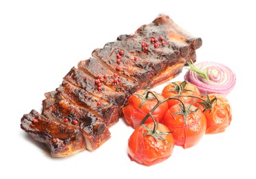 Photo of Delicious roasted pork ribs with tomatoes and onion isolated on white
