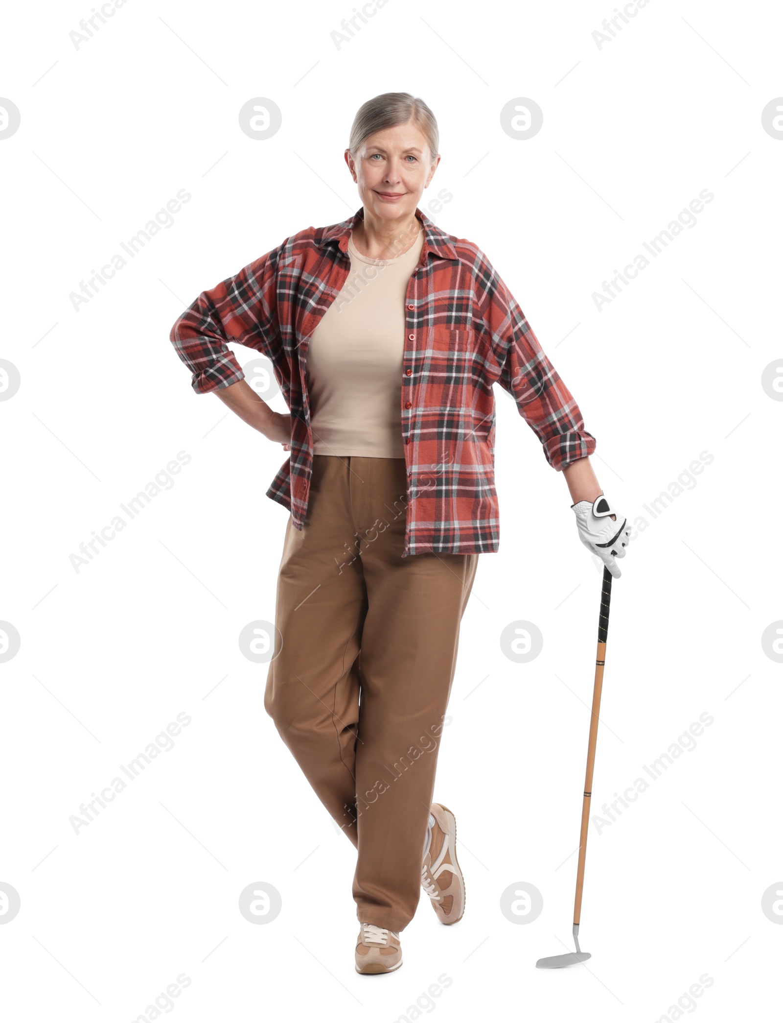 Senior woman with golf club on white background Photo of Senior woman with golf club on white background