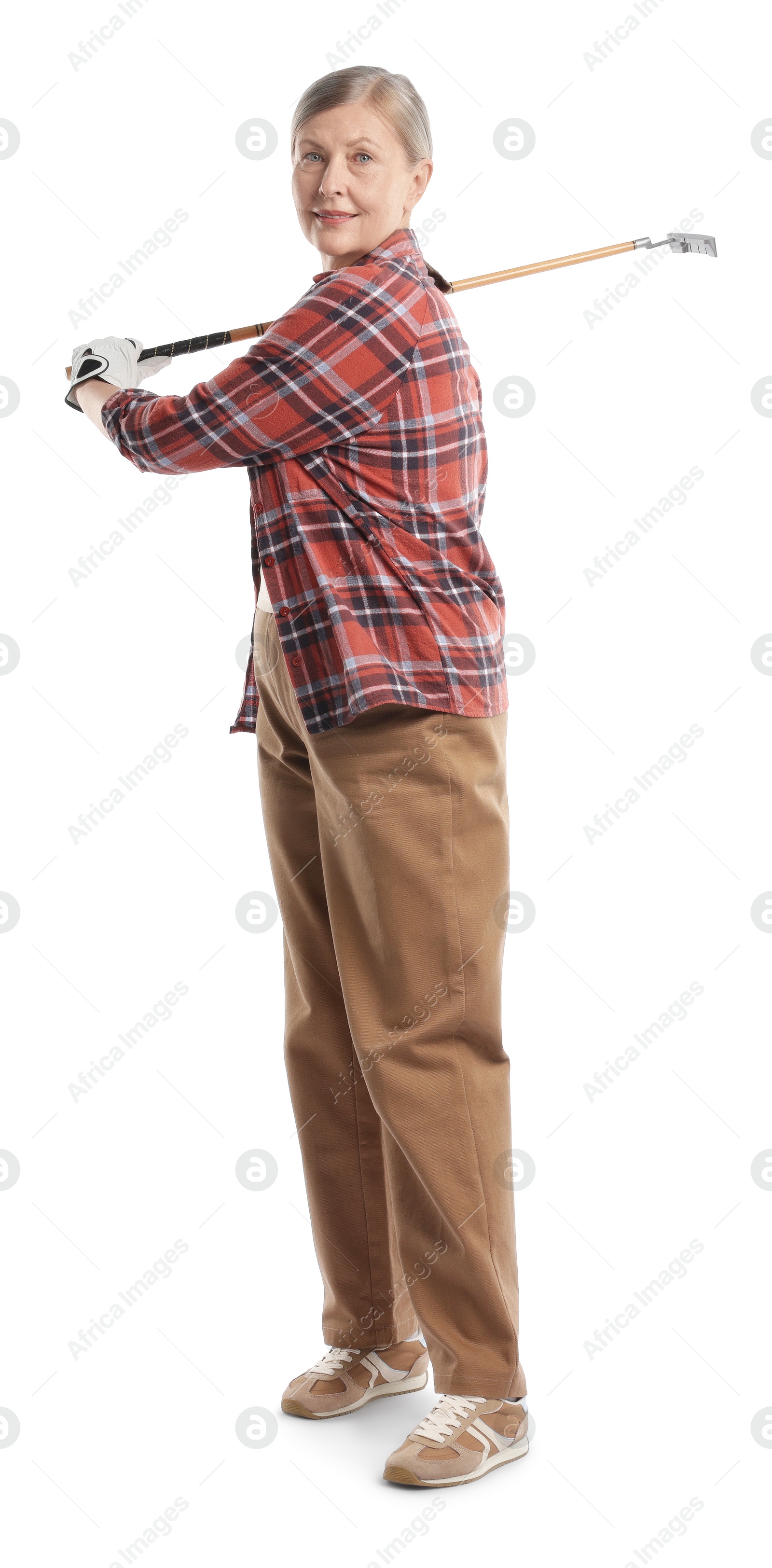 Senior woman with golf club on white background Photo of Senior woman with golf club on white background
