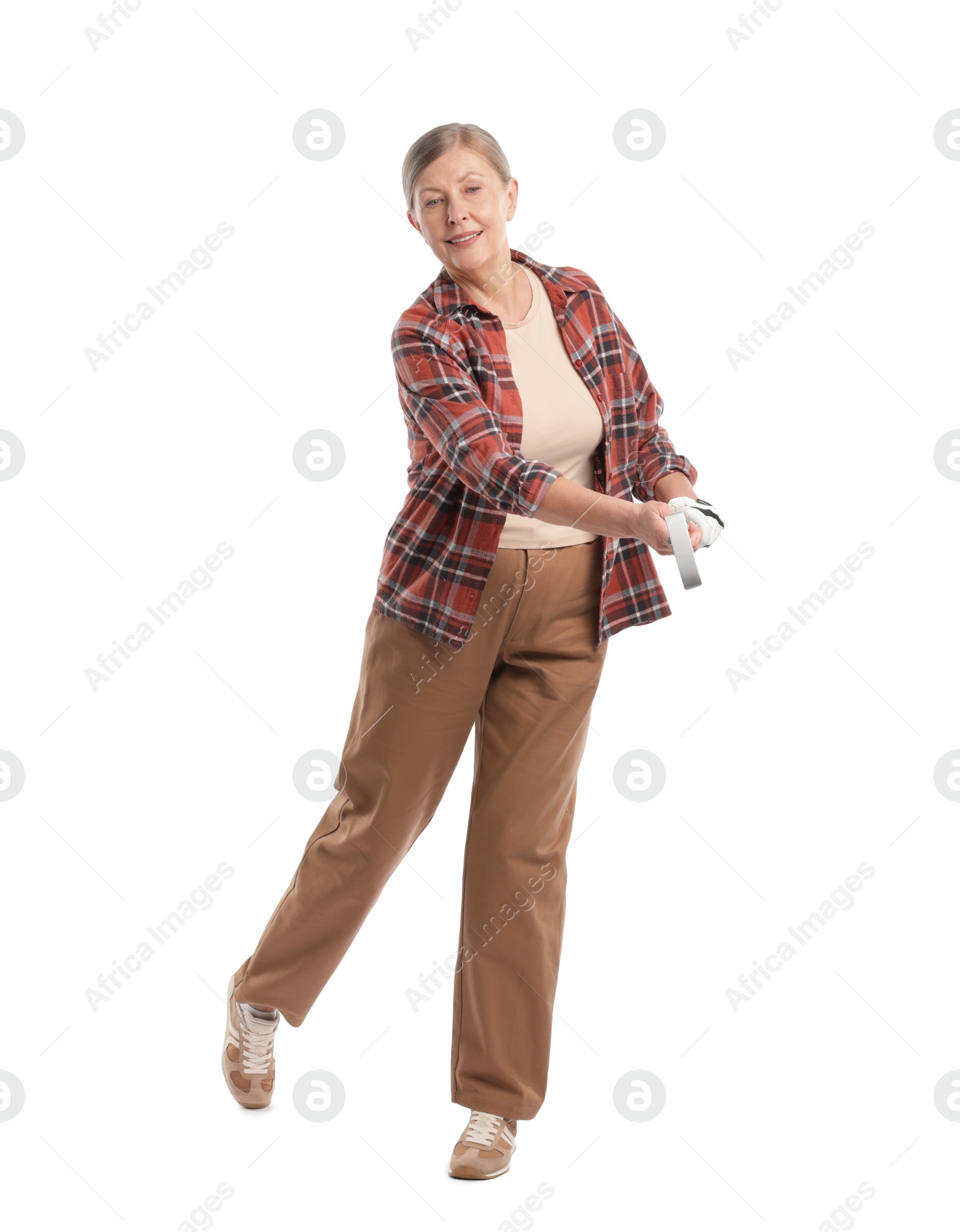 Senior woman with golf club on white background Photo of Senior woman with golf club on white background