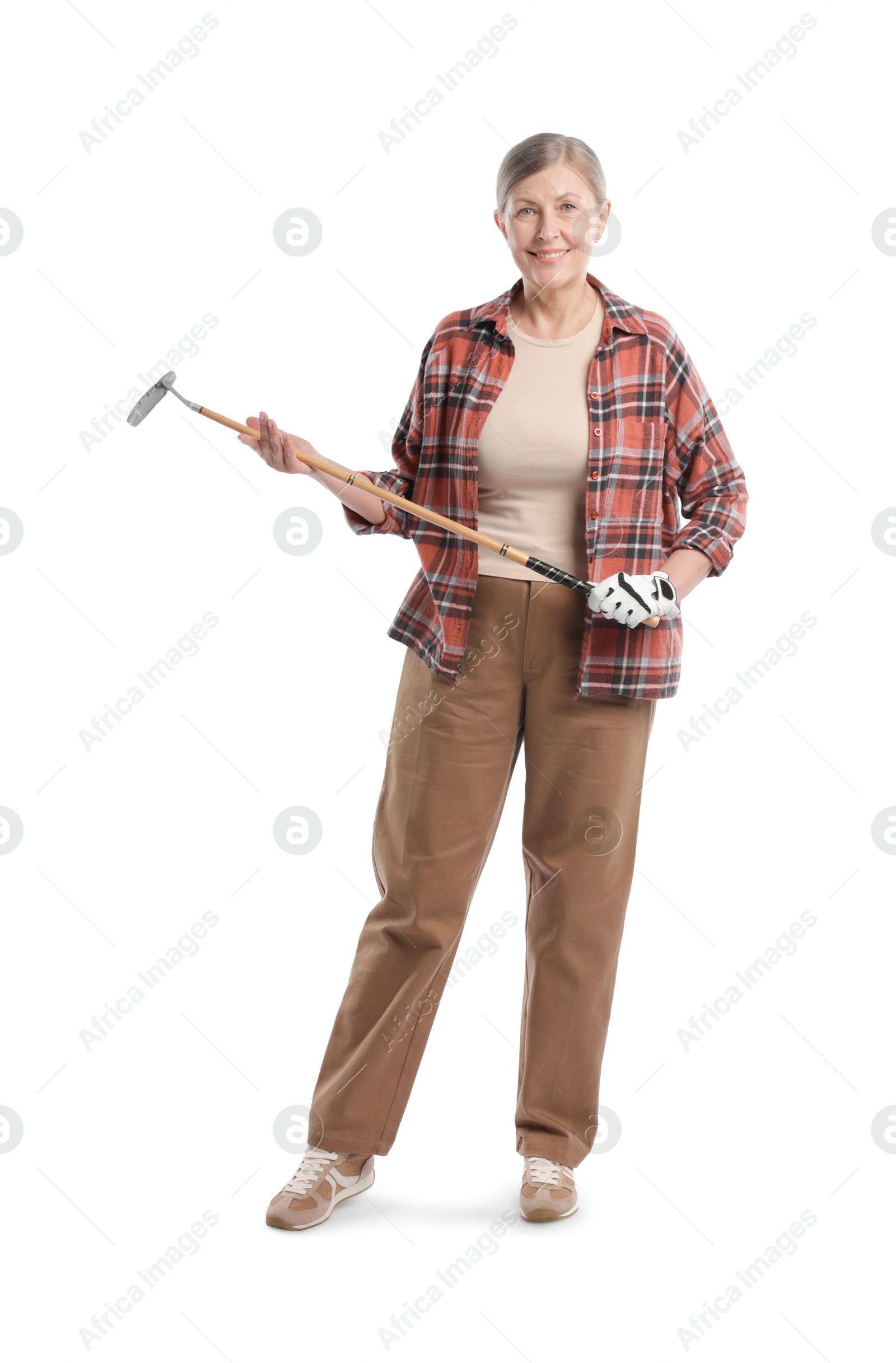 Senior woman with golf club on white background Photo of Senior woman with golf club on white background