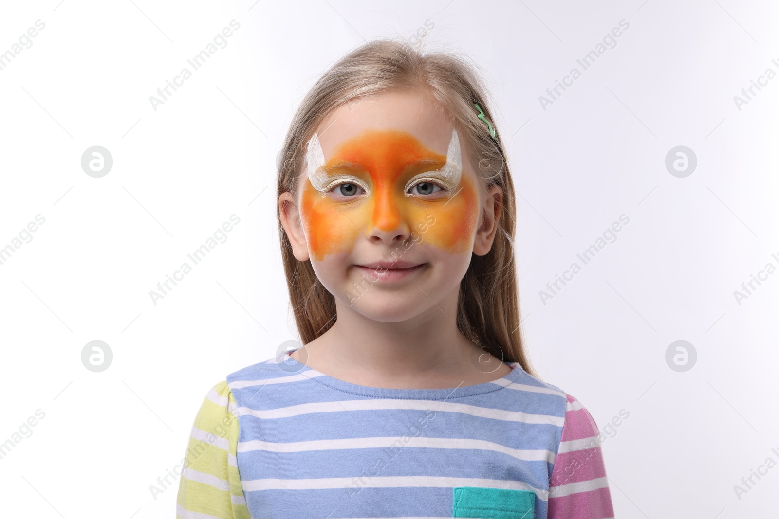Cute girl with fox face painting on white background Photo of Cute girl with fox face painting on white background