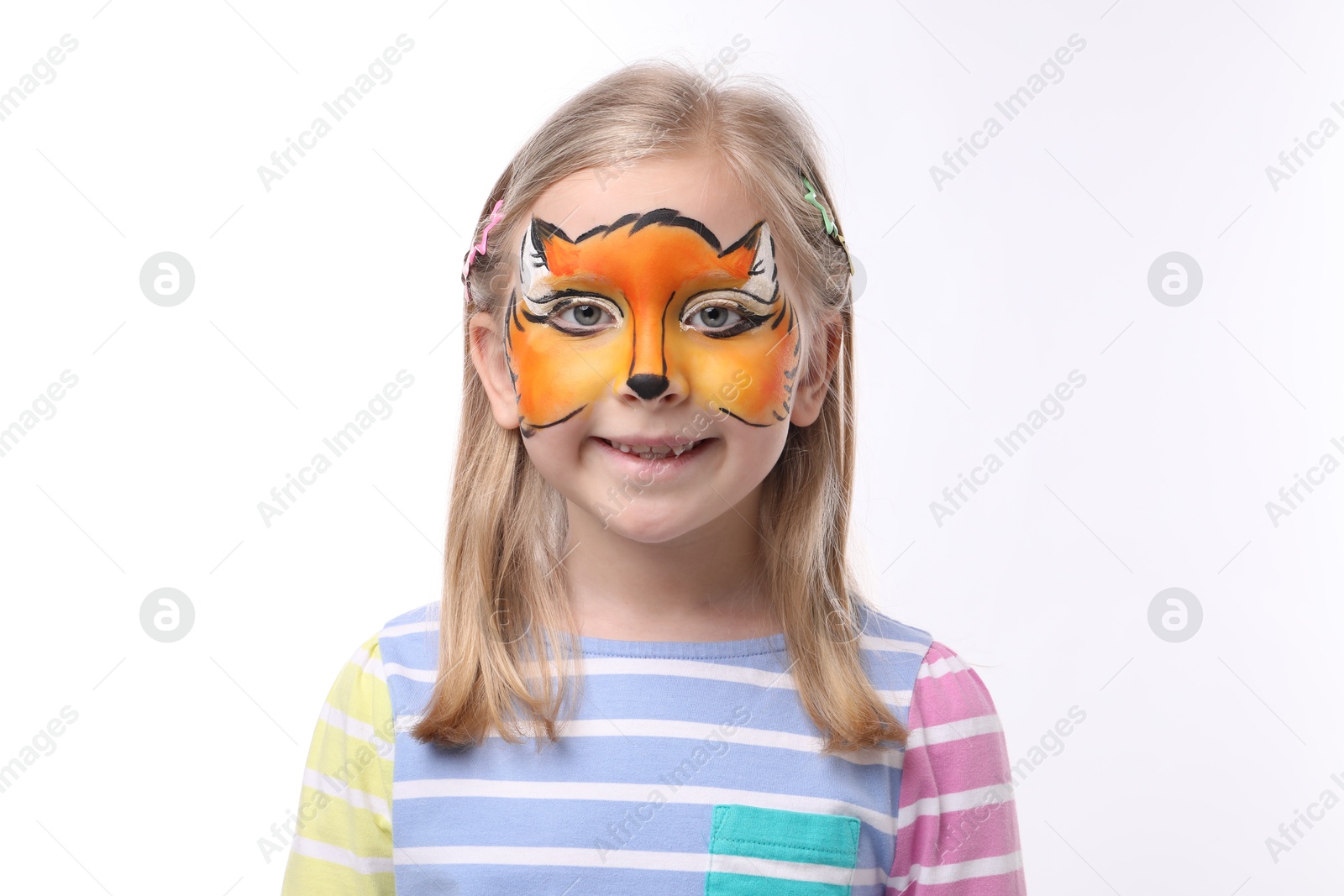 Cute girl with fox face painting on white background Photo of Cute girl with fox face painting on white background