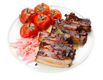 Photo of Delicious spare ribs, onion and sun dried tomatoes isolated on white