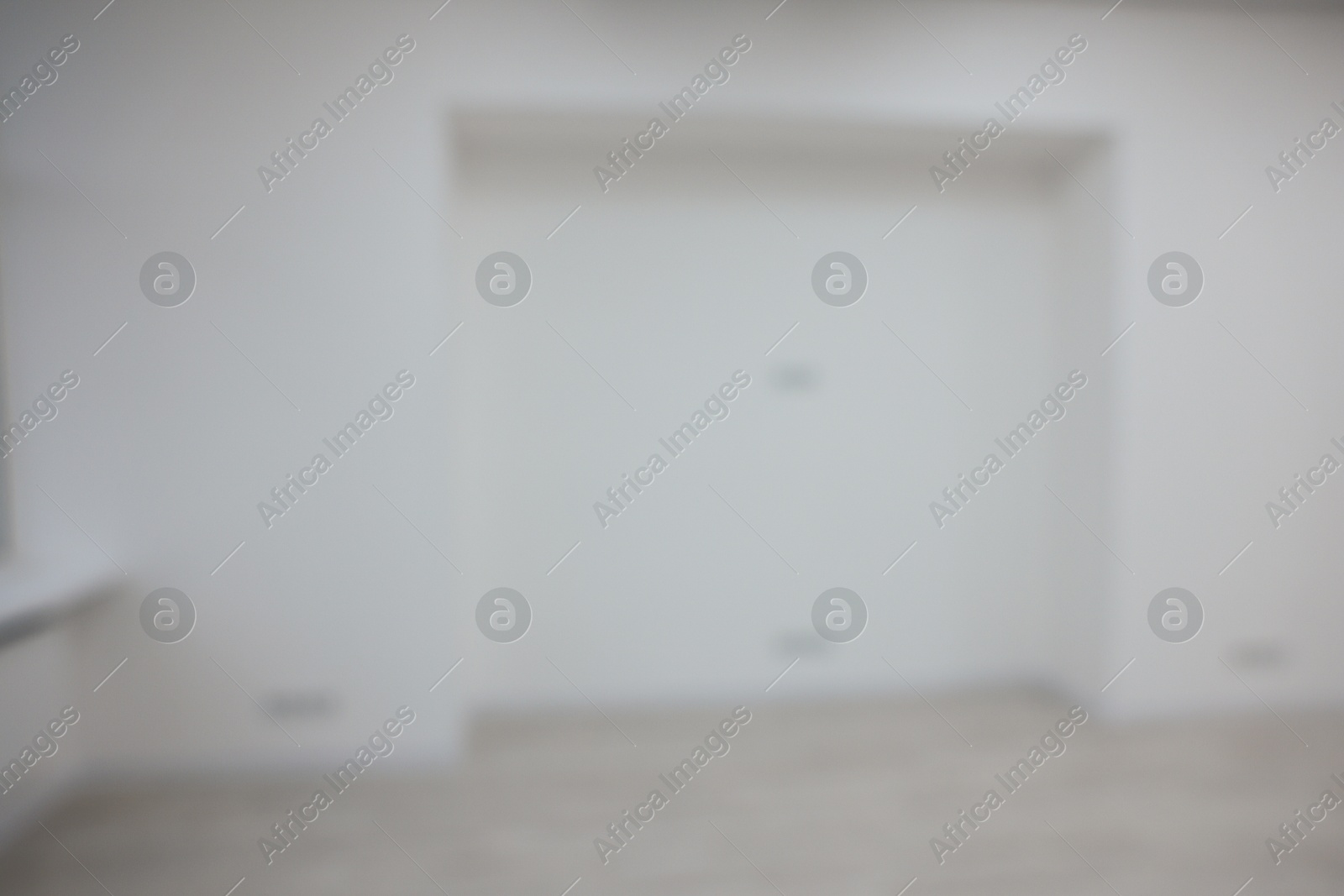 Blurred view of new empty room with wall niche Photo of Blurred view of new empty room with wall niche
