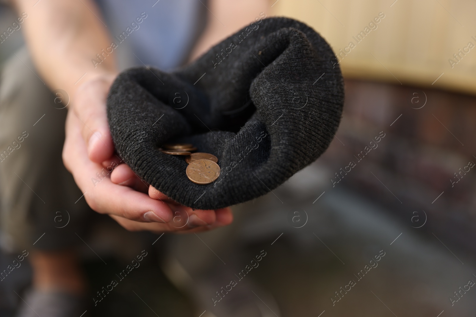 Homeless man with money outdoors, selective focus Photo of Homeless man with money outdoors, selective focus