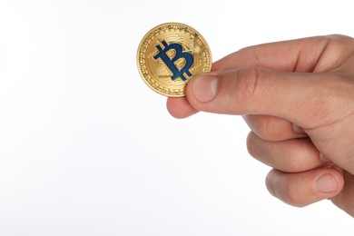Photo of Cryptocurrency. Man holding bitcoin on white background, closeup