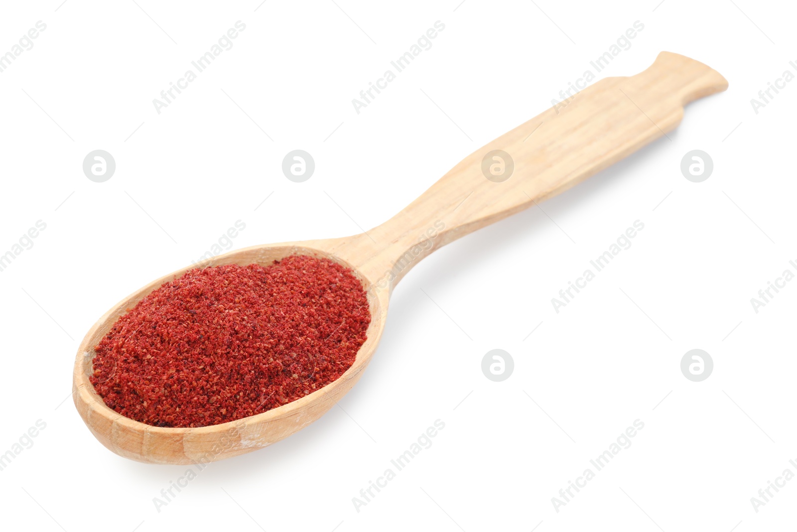 Red pepper powder in wooden spoon isolated on white Photo of Red pepper powder in wooden spoon isolated on white