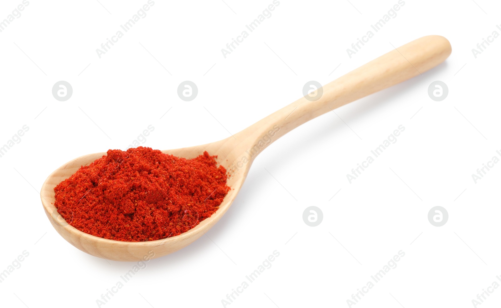 Photo of Aromatic red pepper powder in wooden spoon isolated on white