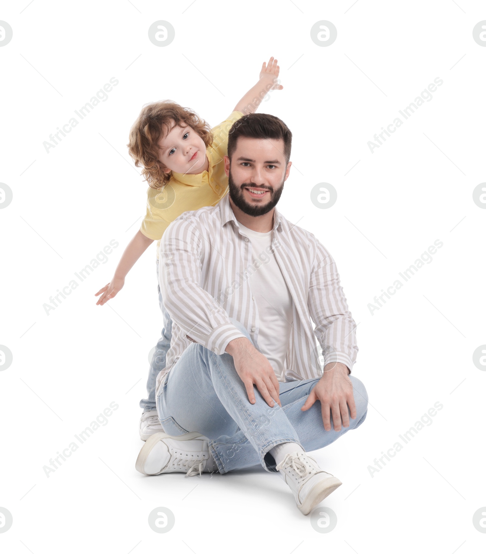 Happy father and his son on white background Photo of Happy father and his son on white background