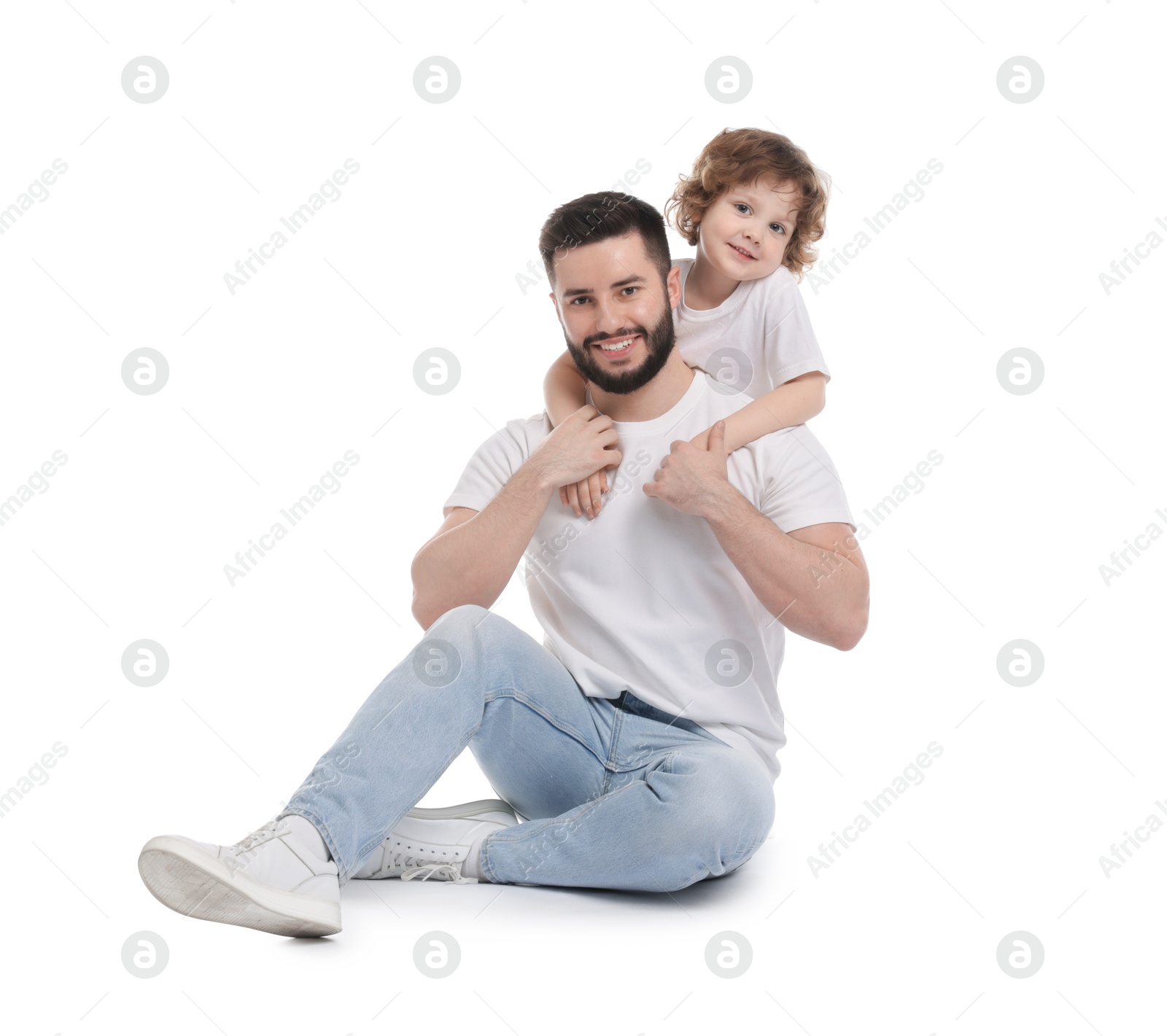 Happy father and his son on white background Photo of Happy father and his son on white background