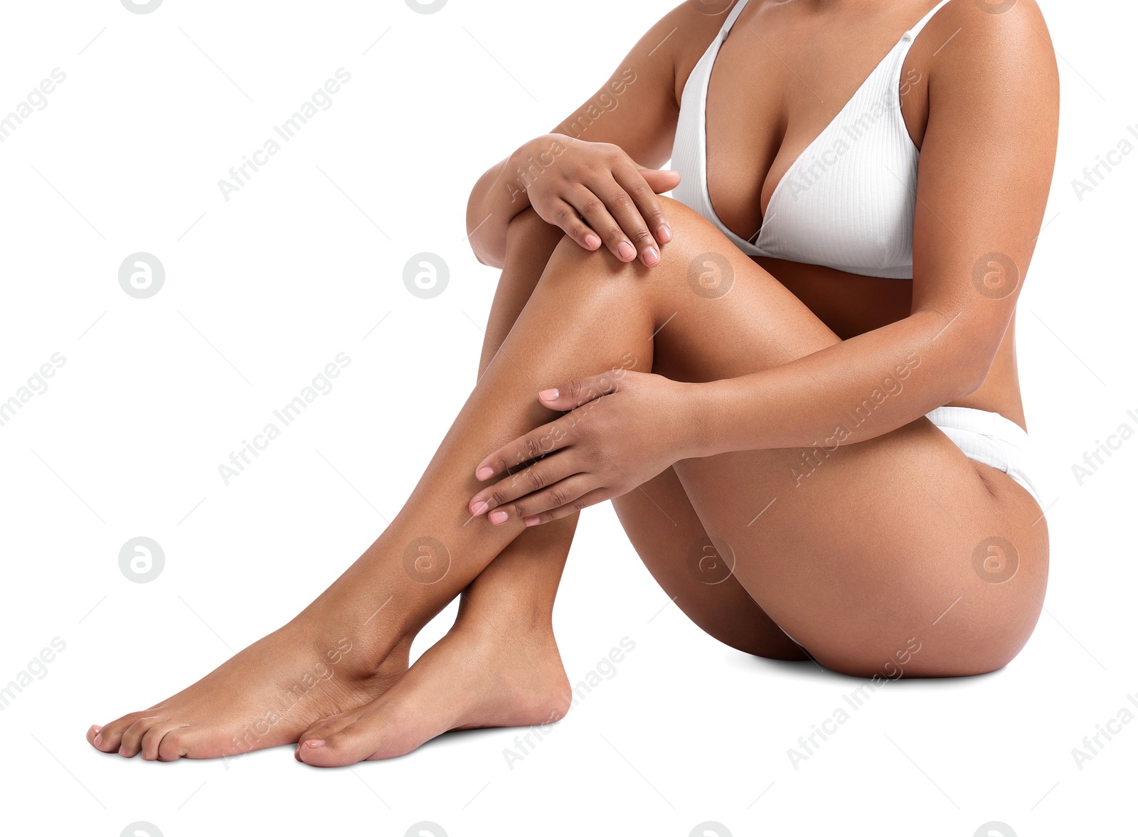 Woman in underwear with smooth skin after epilation procedure on white background, closeup Photo of Woman in underwear with smooth skin after epilation procedure on white background, closeup