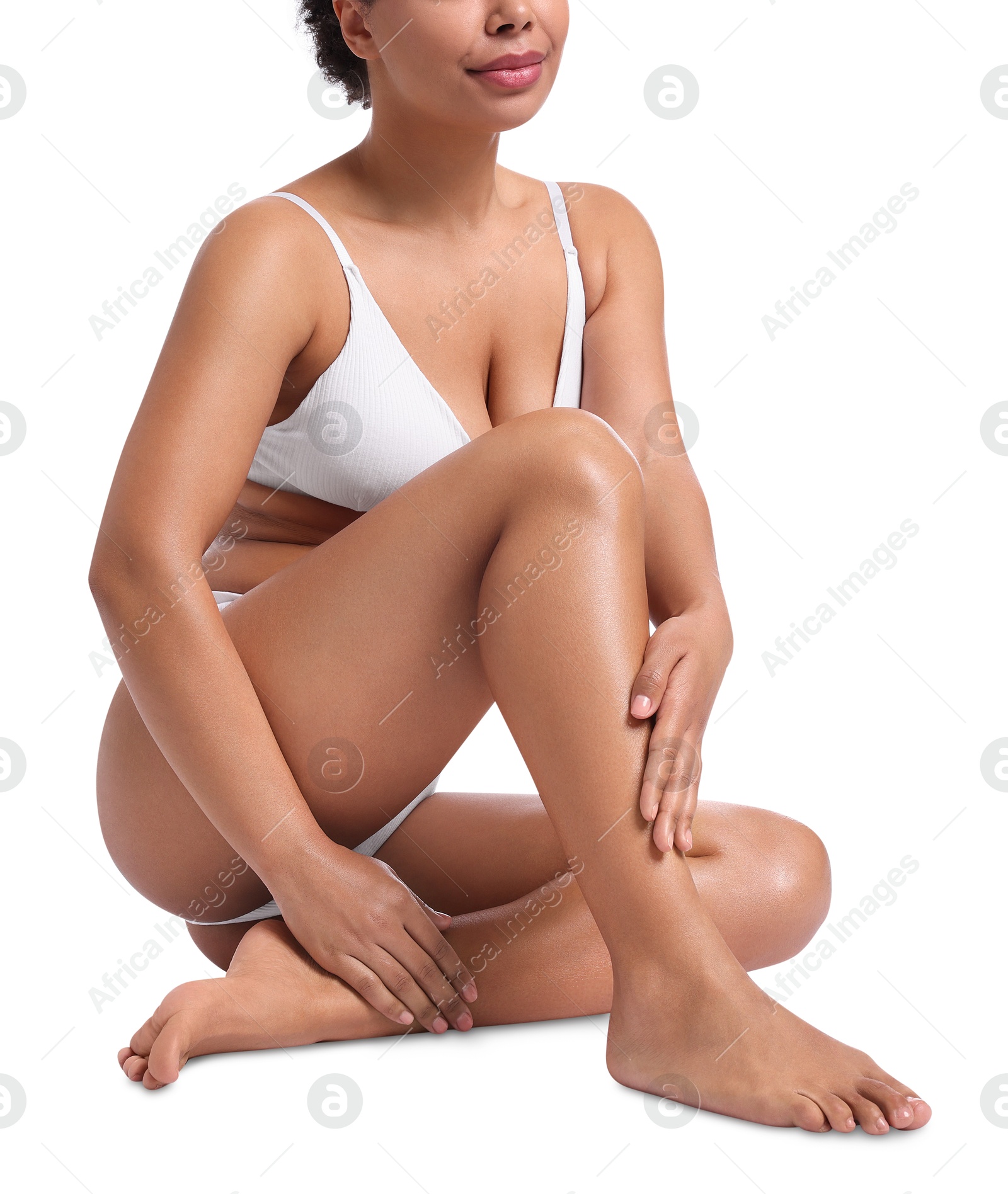 Woman in underwear with smooth skin after epilation procedure on white background, closeup Photo of Woman in underwear with smooth skin after epilation procedure on white background, closeup