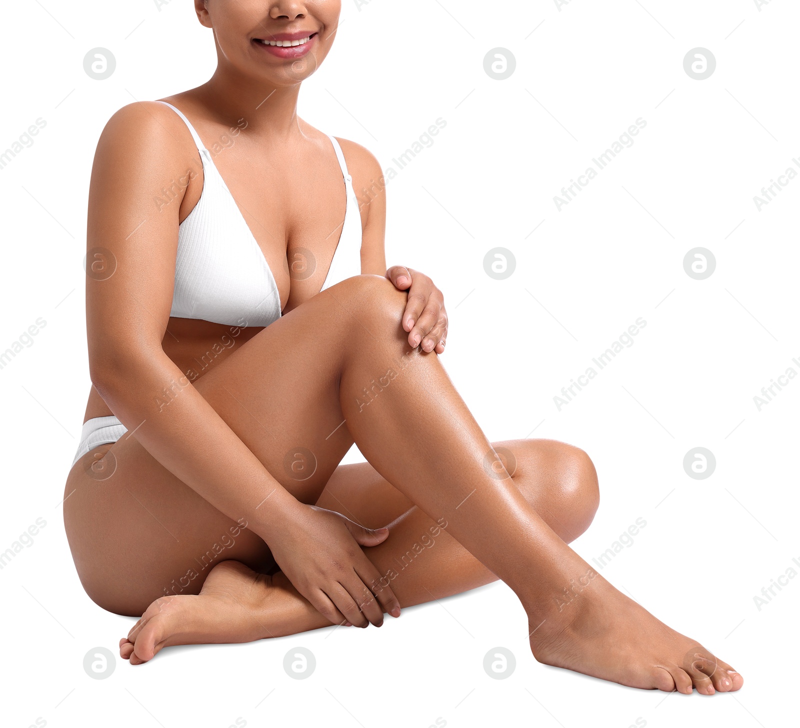 Woman in underwear with smooth skin after epilation procedure on white background, closeup Photo of Woman in underwear with smooth skin after epilation procedure on white background, closeup