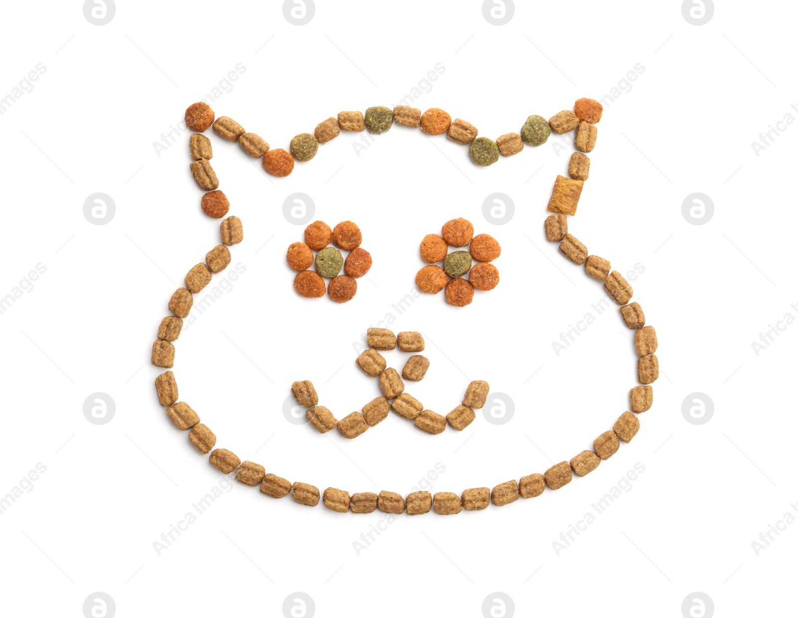 Cat's muzzle made of dry pet food isolated on white, top view Photo of Cat's muzzle made of dry pet food isolated on white, top view