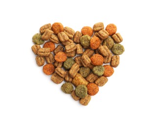 Photo of Heart made of dry pet food isolated on white, top view