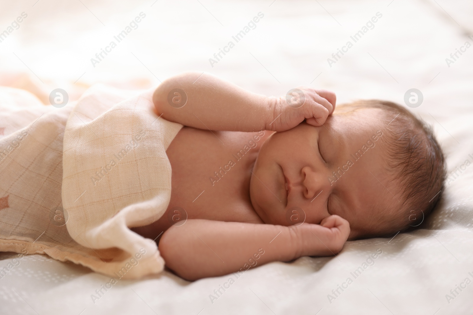Bedtime. Cute little baby sleeping in bed indoors Photo of Bedtime. Cute little baby sleeping in bed indoors