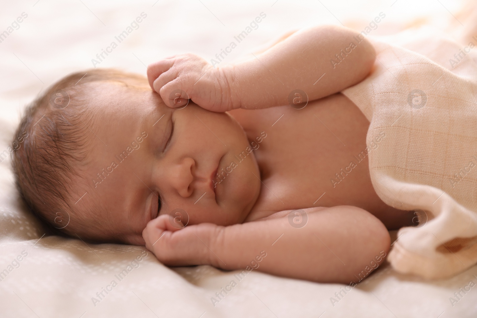 Bedtime. Cute little baby sleeping in bed indoors Photo of Bedtime. Cute little baby sleeping in bed indoors
