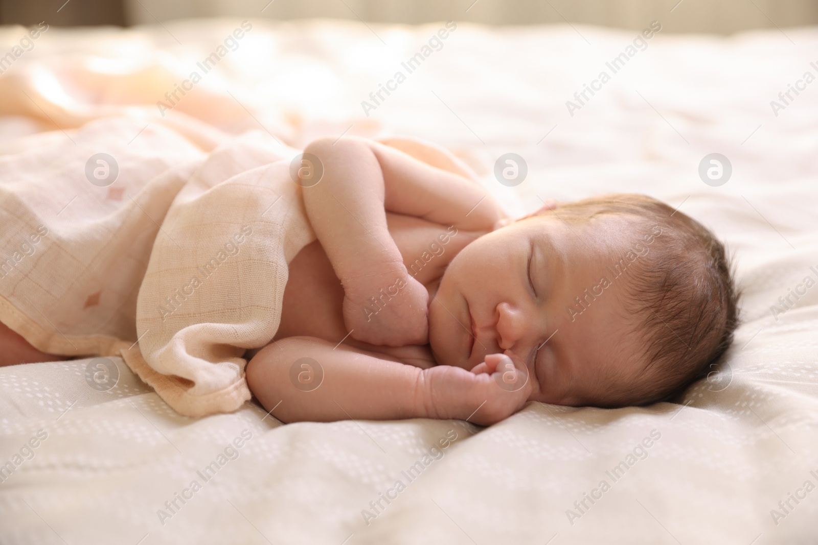 Bedtime. Cute little baby sleeping in bed indoors Photo of Bedtime. Cute little baby sleeping in bed indoors