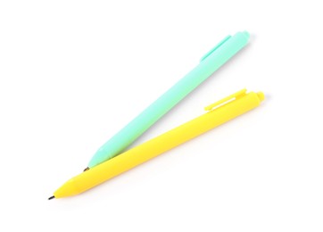 Photo of Stylish pens isolated on white, above view