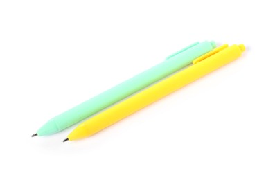 Photo of Stylish pens isolated on white, above view