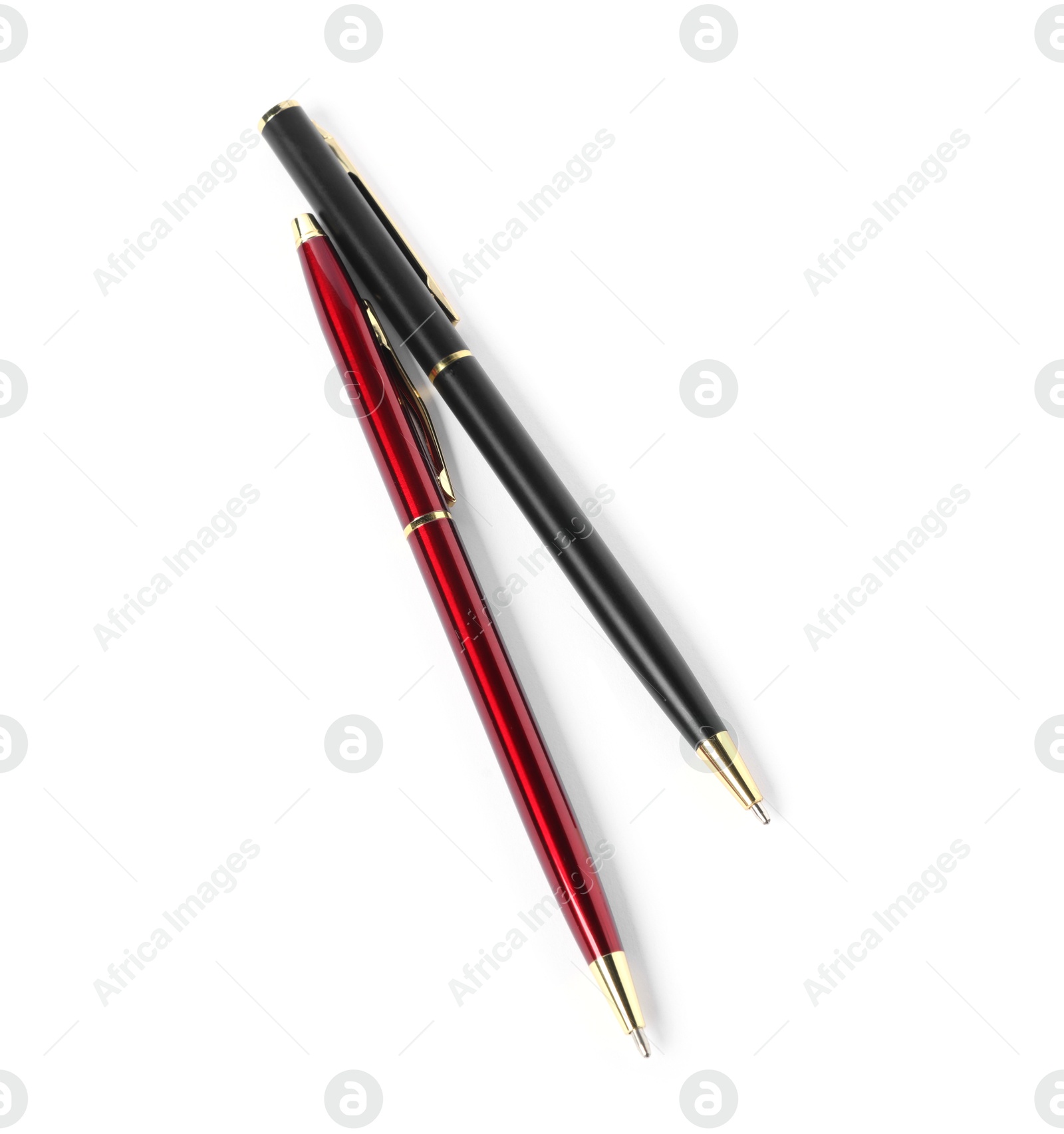 Stylish pens isolated on white, top view Photo of Stylish pens isolated on white, top view