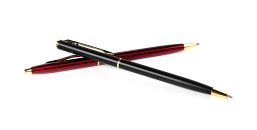 Photo of Stylish pens isolated on white. Office supply