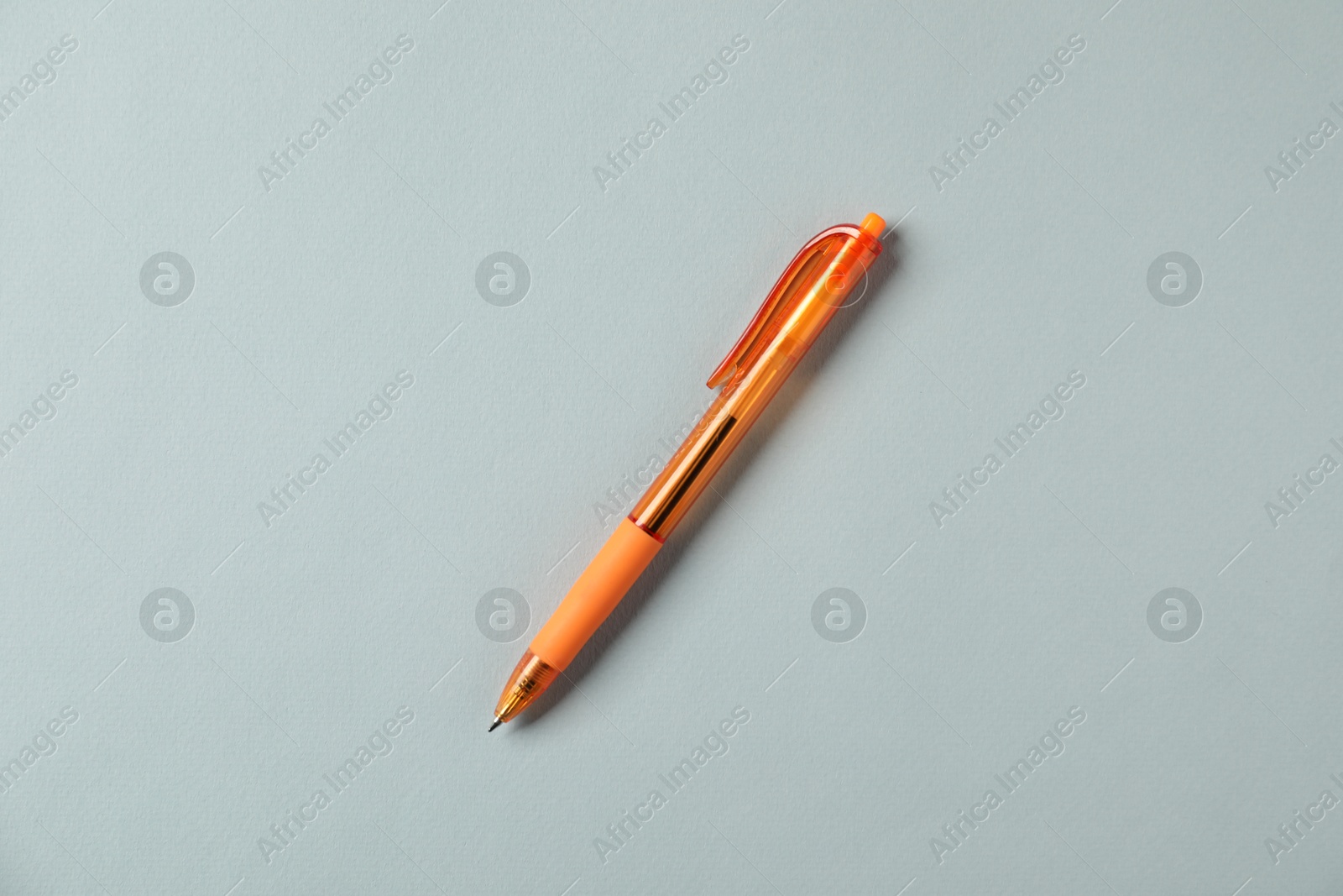 One stylish pen on grey background, top view Photo of One stylish pen on grey background, top view