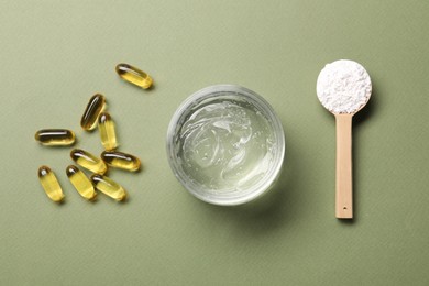 Photo of Collagen capsules, gel and powder on light green background, flat lay