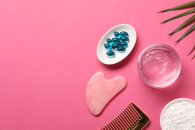 Photo of Collagen capsules, powder, gel, comb and gua sha on pink background, flat lay. Space for text