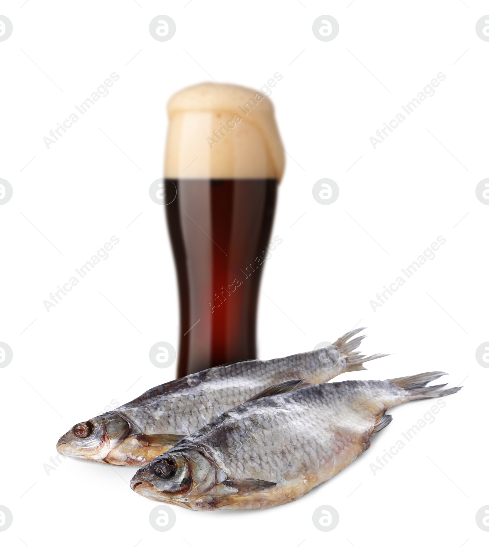 Full glass of beer and dried fish on white background Image of Full glass of beer and dried fish on white background