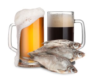 Image of Full mugs of different beer and dried fish isolated on white