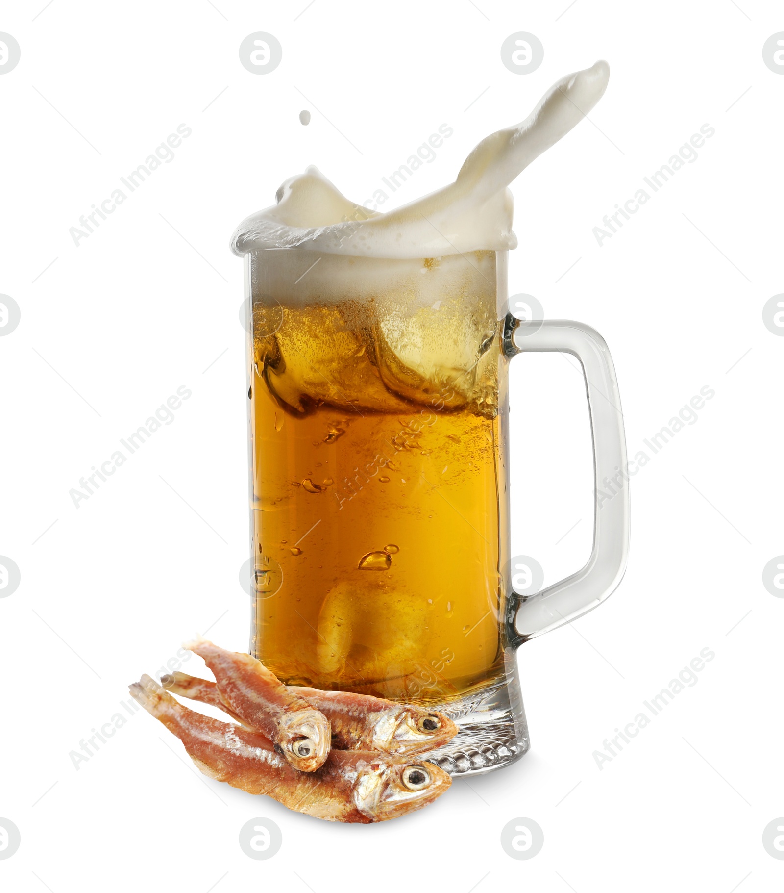 Beer splashing out of glass mug and dried fish isolated on white Image of Beer splashing out of glass mug and dried fish isolated on white