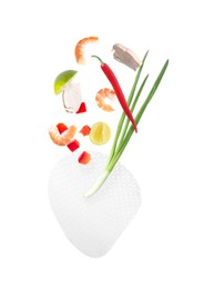 Image of Rice paper and different ingredients falling on white background